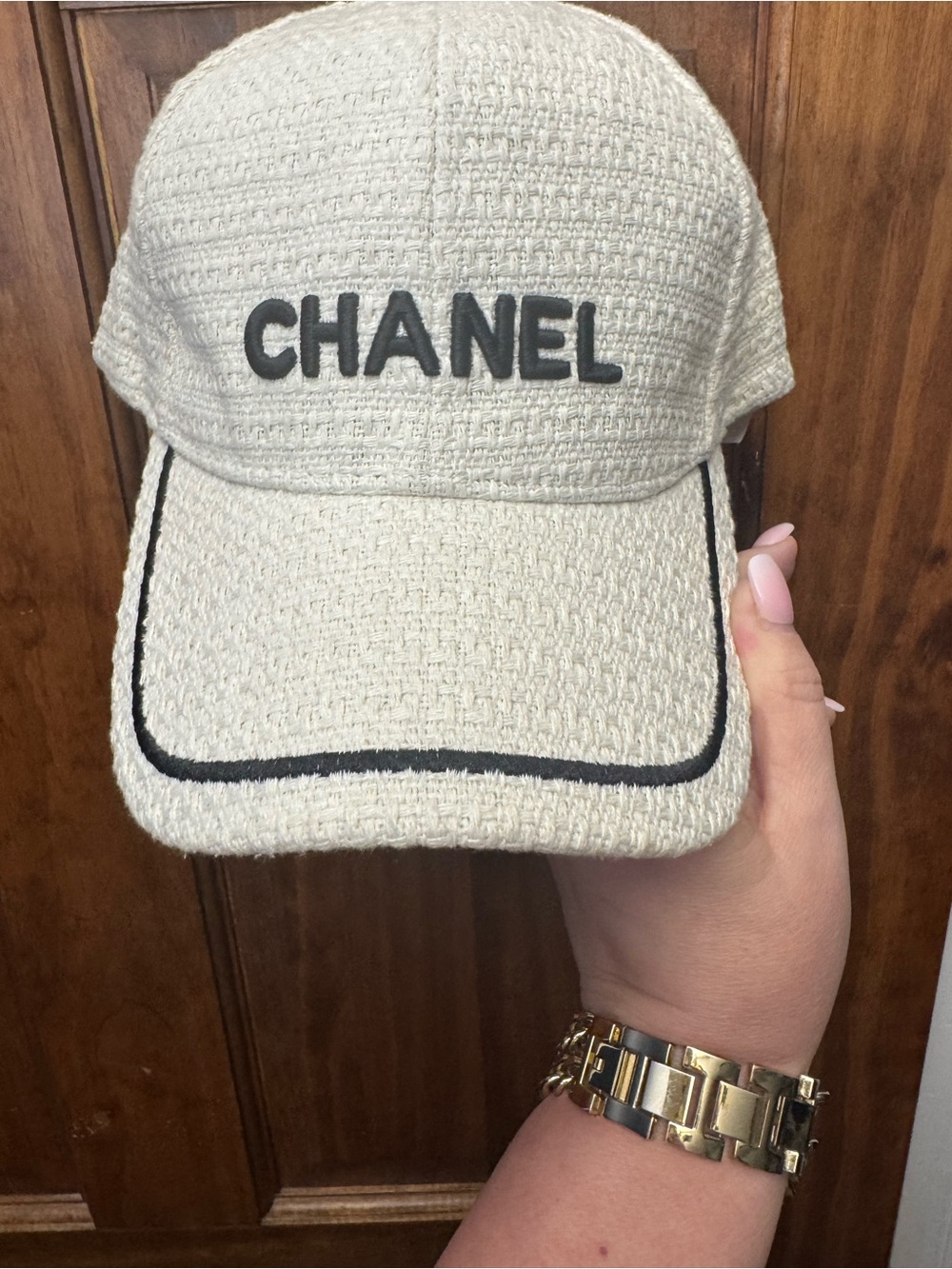 White tweed cap - source unknown